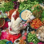 muslim_woman_selling_fresh_vegetables_at_market_in_kota_baru_malaysia